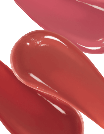 Swatches of ICD Makeup Butter Lip Tint Semi Matte in shades of pink and red, showcasing a glossy finish.