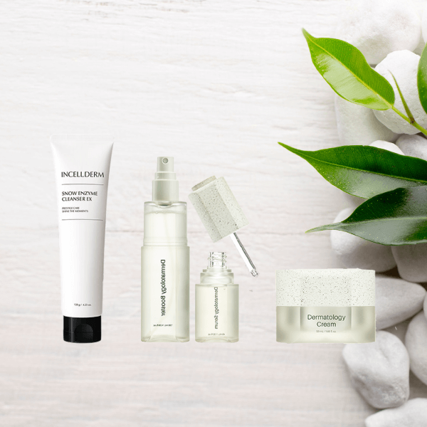 Riman ICD Mini Ritual Set - Snow Enzyme Cleanser, Dermatology First Package booster and serum bottles and Dermatology Cream with natural lighting and green accents