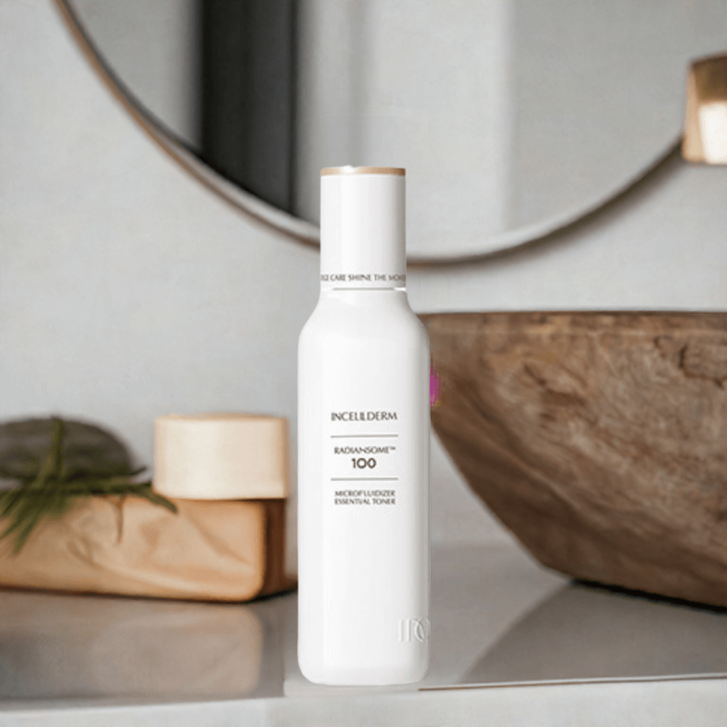 RADIANSOME 100 Microfluidizer Essential Toner bottle on a countertop with a mirror in the background, showcasing skincare benefits.