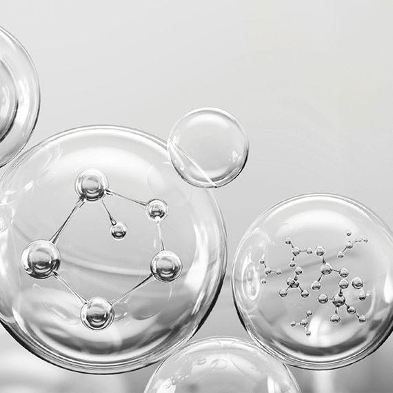 Close-up of clear molecular structures representing skin-nourishing ingredients in cosmetic products.