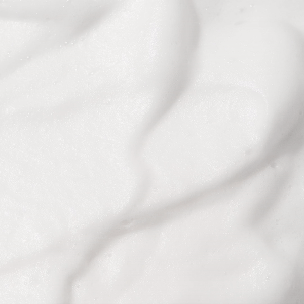 Close-up of the creamy, snow-like texture of Incellderm Snow Enzyme Cleanser EX, emphasizing its foamy consistency.