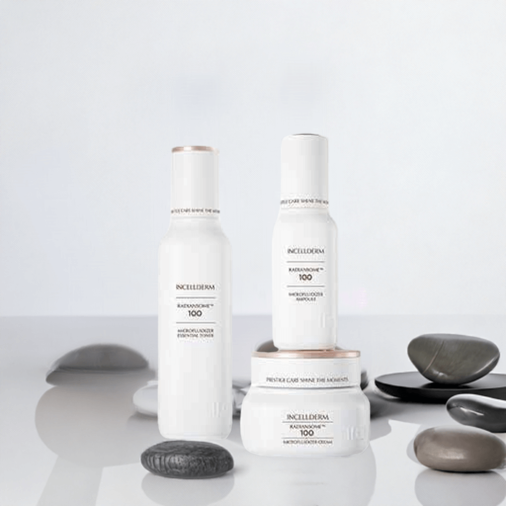 Radiansome Premium Set featuring Essential Toner, Ampoule, and Cream for brightening and hydrating skin.