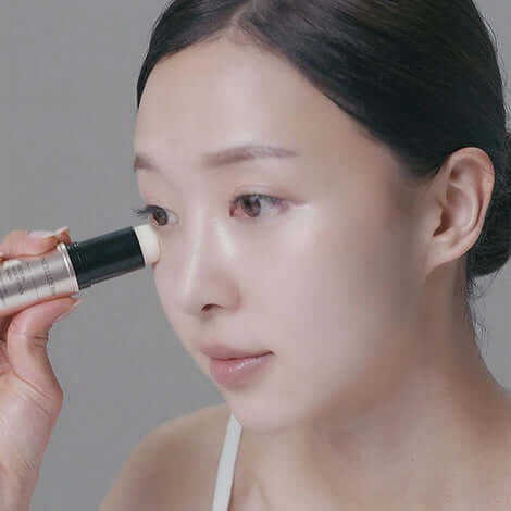 Riman ICD Multi Stick Balm displayed with skincare accessories – Korean glow stick for face and body