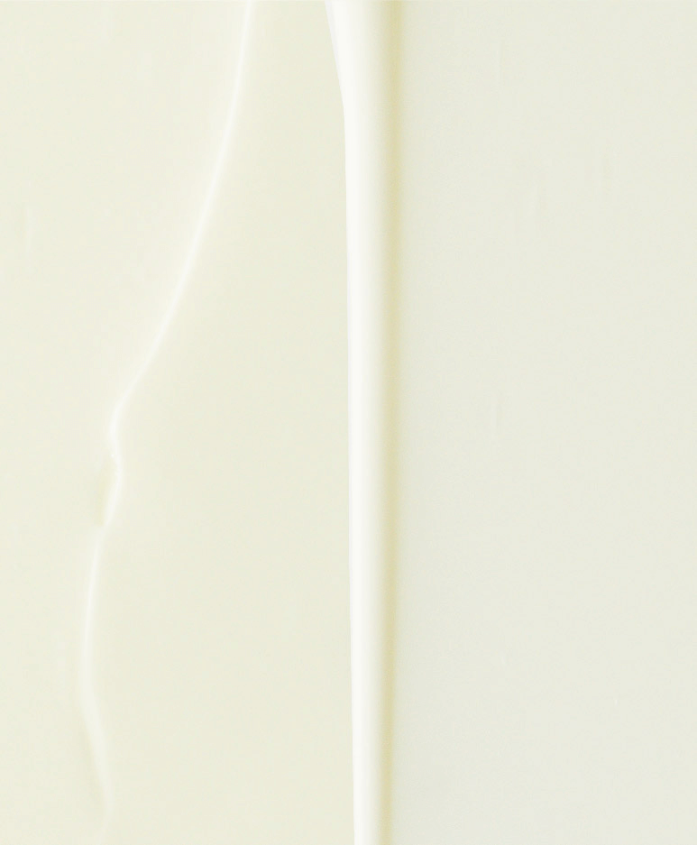 Creamy texture of lightweight sunscreen for hydration and broad spectrum SPF 50+ protection.