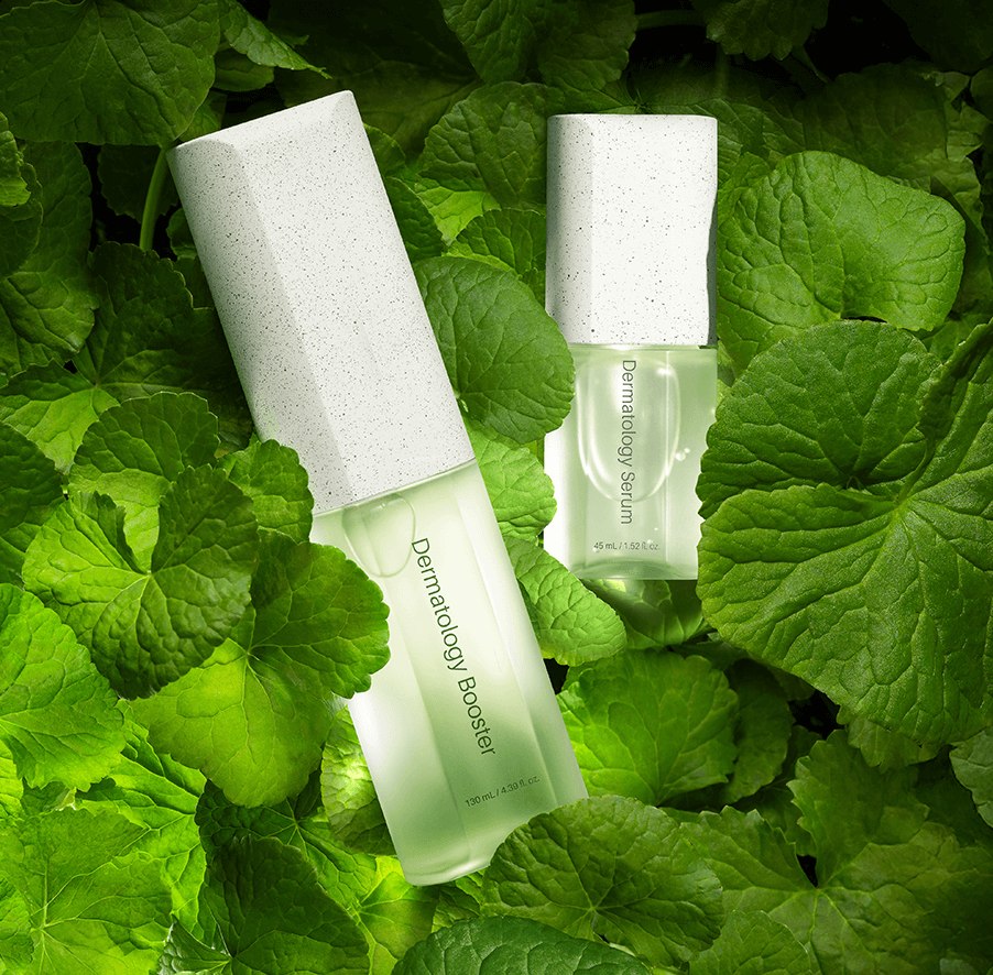 Riman ICD Dermatology Booster EX and Serum EX bottles with green foliage accent