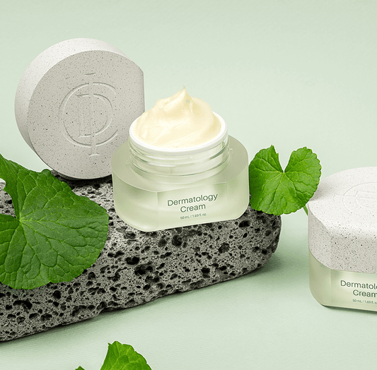 Top-down view of Riman Dermatology Cream jar opened to show creamy texture – moisture-rich formula