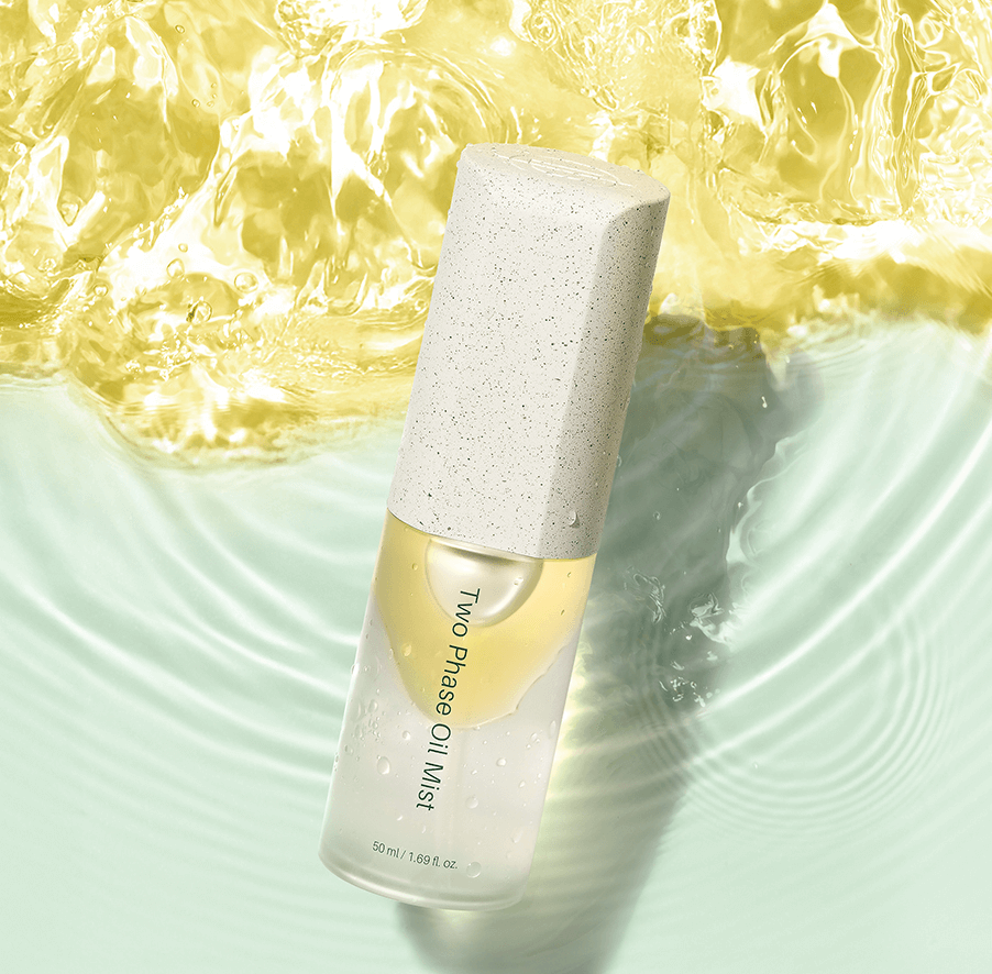 ICD Two Phase Oil Mist packaging with a rich yellow oil blend, creating a moisturizing mist for bright, dewy skin.