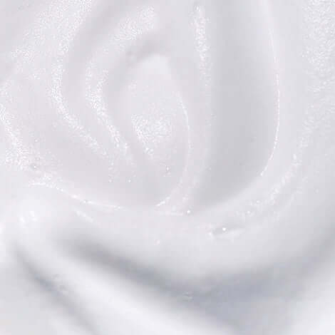 Close-up of Incellderm Snow Enzyme Cleanser EX with a foamy, creamy texture for gentle skin cleansing.