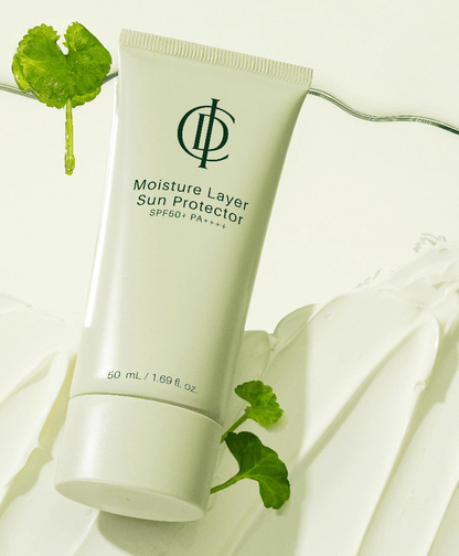 ICD Moisture Layer Sunscreen in a tube with SPF 50+, highlighting broad spectrum protection and hydration.