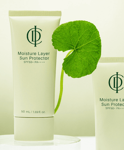 ICD Moisture Layer Sunscreen SPF 50+ with hydrating ingredients, featuring a natural leaf for a fresh look.