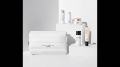 Radiansome 100 Advanced Ritual Travel Kit includes travel-sized skincare products in a chic white pouch.