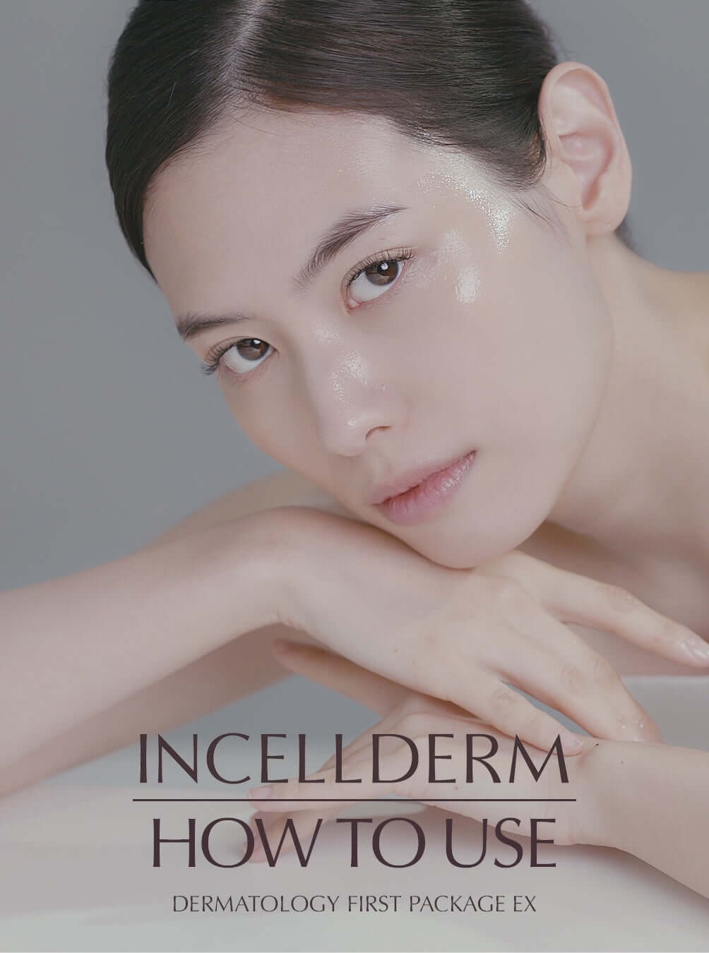 Woman with glass skin using Dermatology Booster EX and Serum EX  f