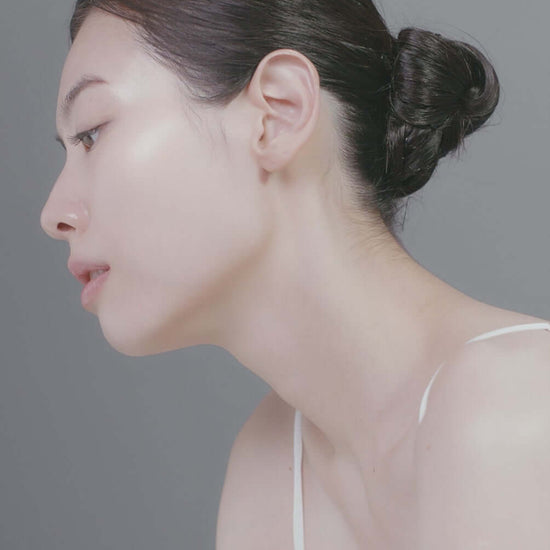 Profile view of a woman showcasing healthy, glowing skin, ideal for displaying skincare benefits.