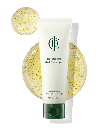 ICD Balancing Gel Cleanser | KBeauty-USA.com tube next to a round gel bubble with exfoliating beads.