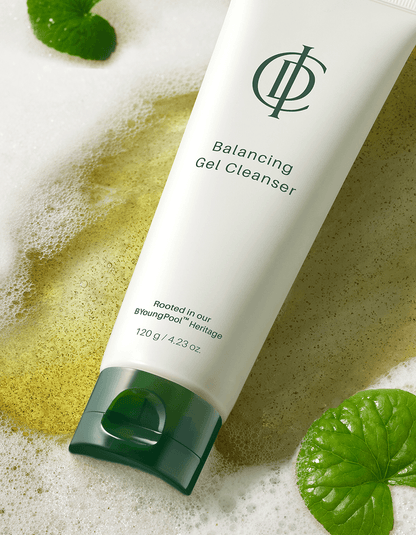 ICD Balancing Gel Cleanser | KBeauty-USA.com displayed on a textured surface with mint leaves and bubbles.